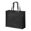 Shopper in RPET a soffietto con finitura laminata in diverse colorazioni con mainici lunghi da 105gr 42x35x15cm
