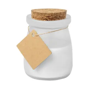 Candela in vaso di vetro e coperchio in sughero