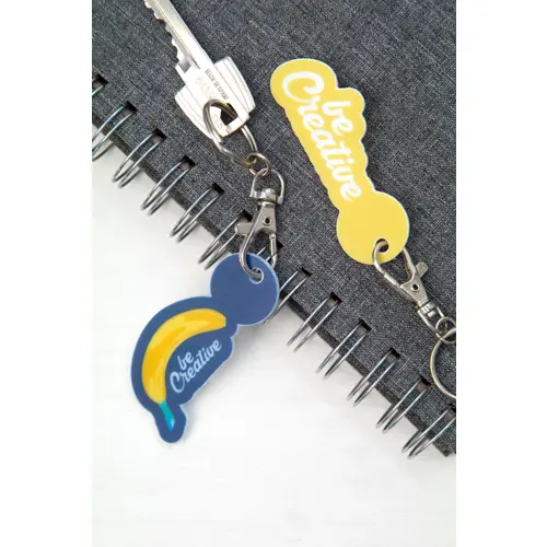Portachiavi in plastica con forma personalizzata e moneta per carrello stampa su un lato