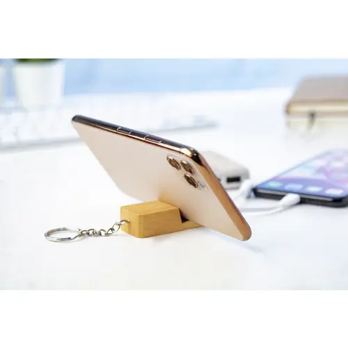 Portachiavi e supporto per il cellulare in bambù con cavi di ricarica USB