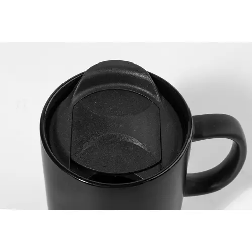 Tazza in ceramica con base in sughero coperchio in PP finitura esterna opaca ed interna lucida confezione in cartoncino kraft 325ml