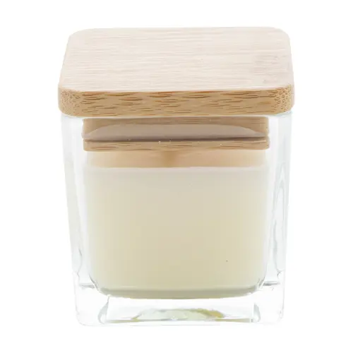 Candela profumata a base di cera vegetale in contenitore di vetro con coperchio in bambù