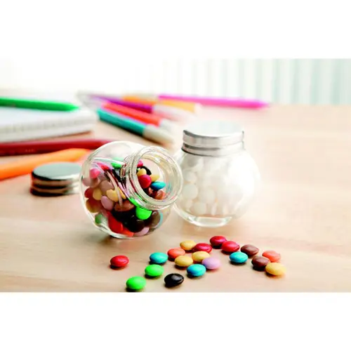 Barattolo con caramelle al cioccolato