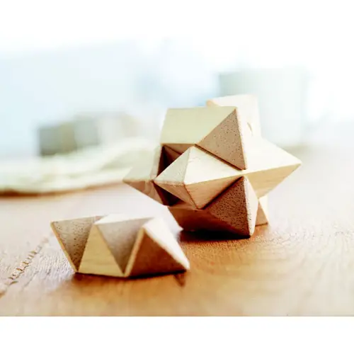 Puzzle in legno a forma di stella in custodia di cotone