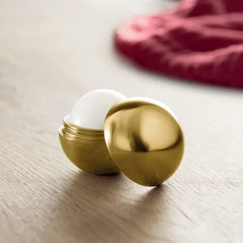 Burro di cacao UV a forma di pallina con finiture metalliche