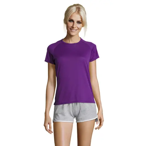T-shirt da donna sportiva colori assortiti a girocollo con maniche taglio raglan in poliestere traspirante 140gr