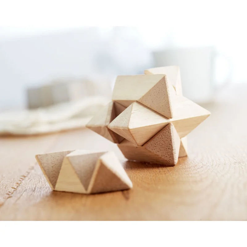 Puzzle in legno a forma di stella in custodia di cotone